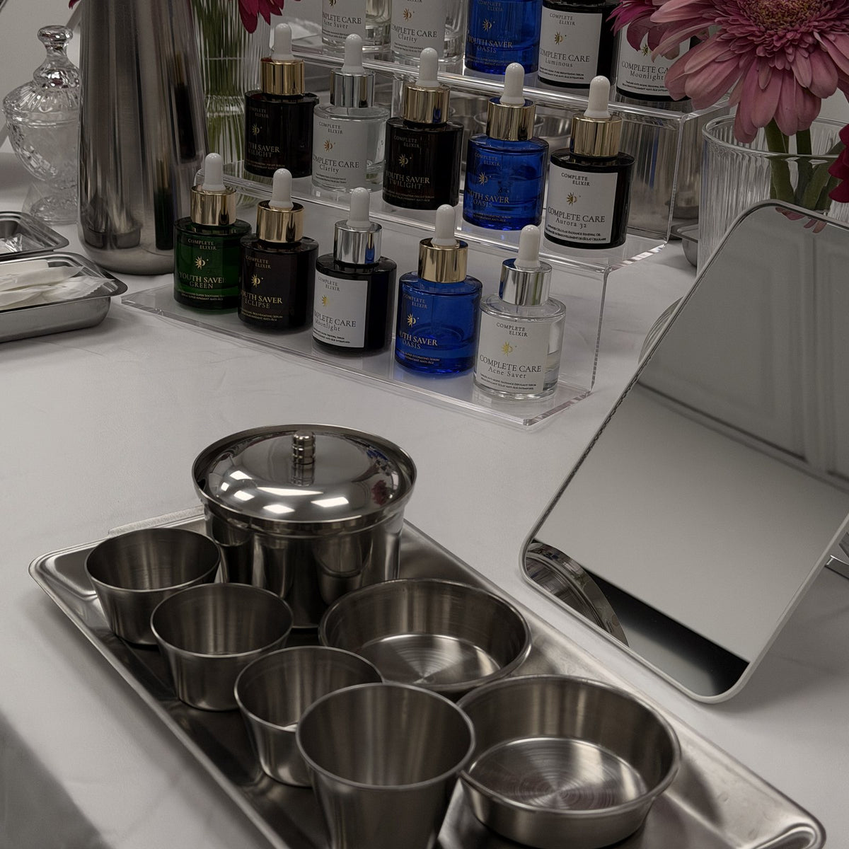 Stainless steel mixing bowls laid out on a tray for a hands-on Creator's Lab session