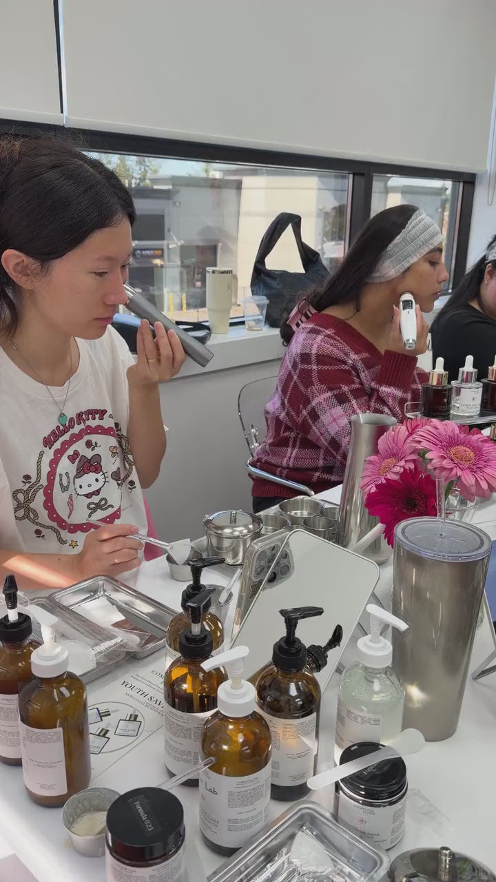 Creators trying a skincare device while the founder explains it