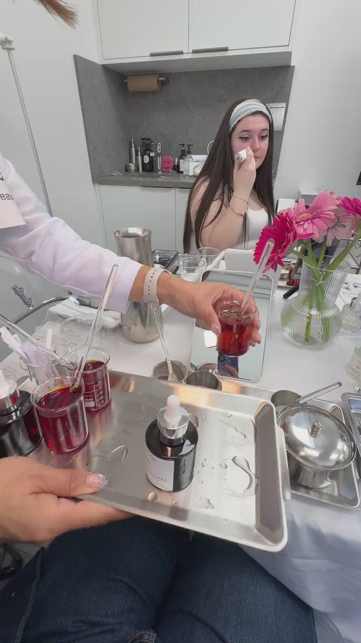 An infusion being served to creators at the table